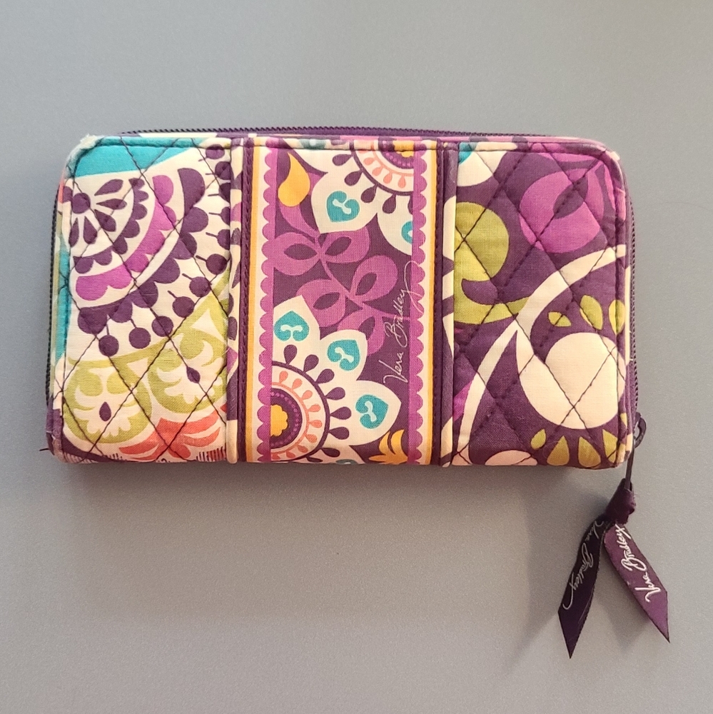 Vera Bradley Plumb Crazy Accordion Wallet. Some wear and tear. Good Condition.